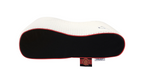 White and black pillow with red accents on a white background