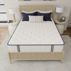 Mattress on a bed with wicker headboard and nightstands in a bedroom setting