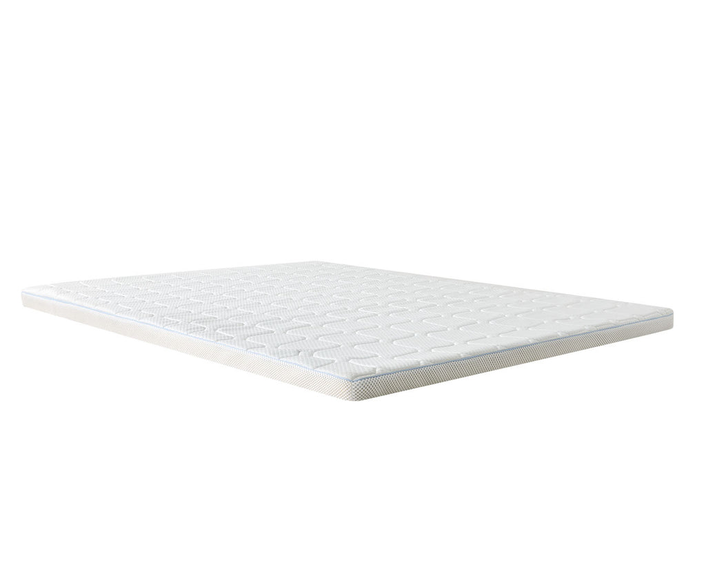 A white mattress topper with a quilted geometric pattern on top and a textured edge, shown floating at an angle against a solid white background.