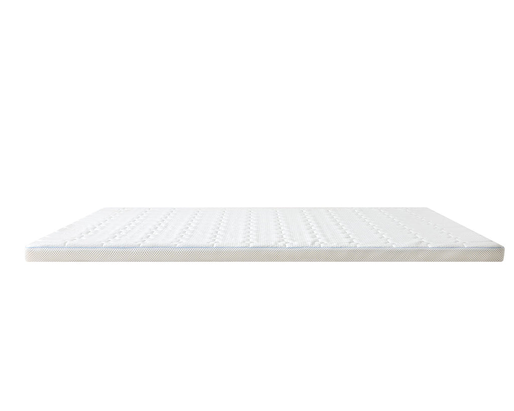 A white textured mattress topper or mattress slice shown from a top-down view on a solid white background.