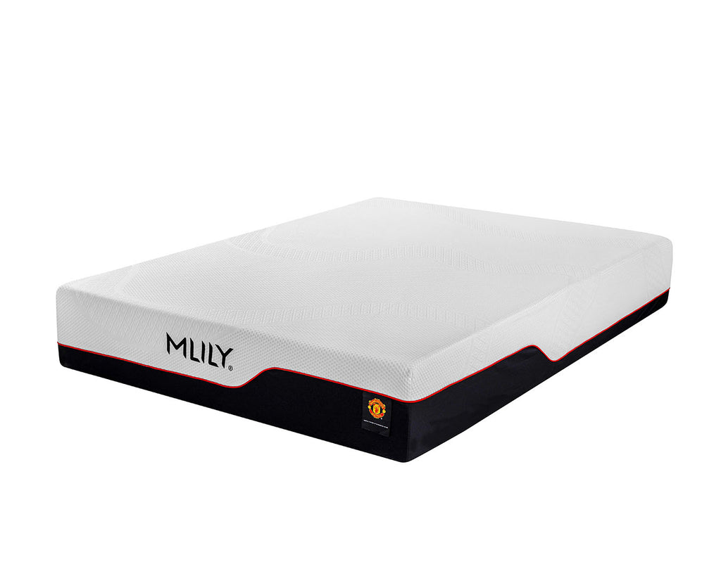 A mattress shown at an angle on a plain white background, featuring a white top surface, a black base, and thin red trim lines. The brand name 'MILY' is printed on the side.