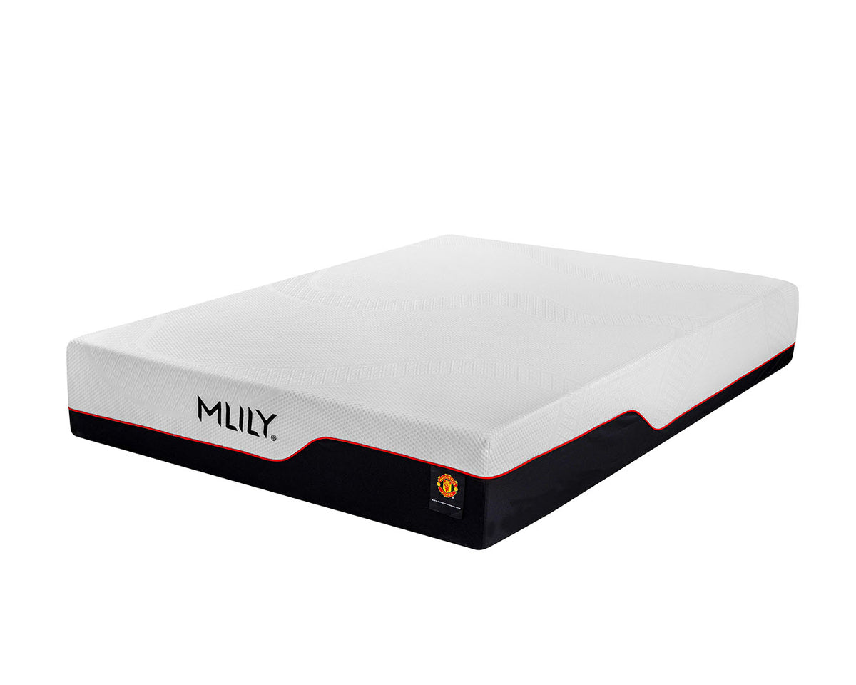 A mattress shown at an angle on a plain white background, featuring a white top surface, a black base, and thin red trim lines. The brand name 'MILY' is printed on the side.