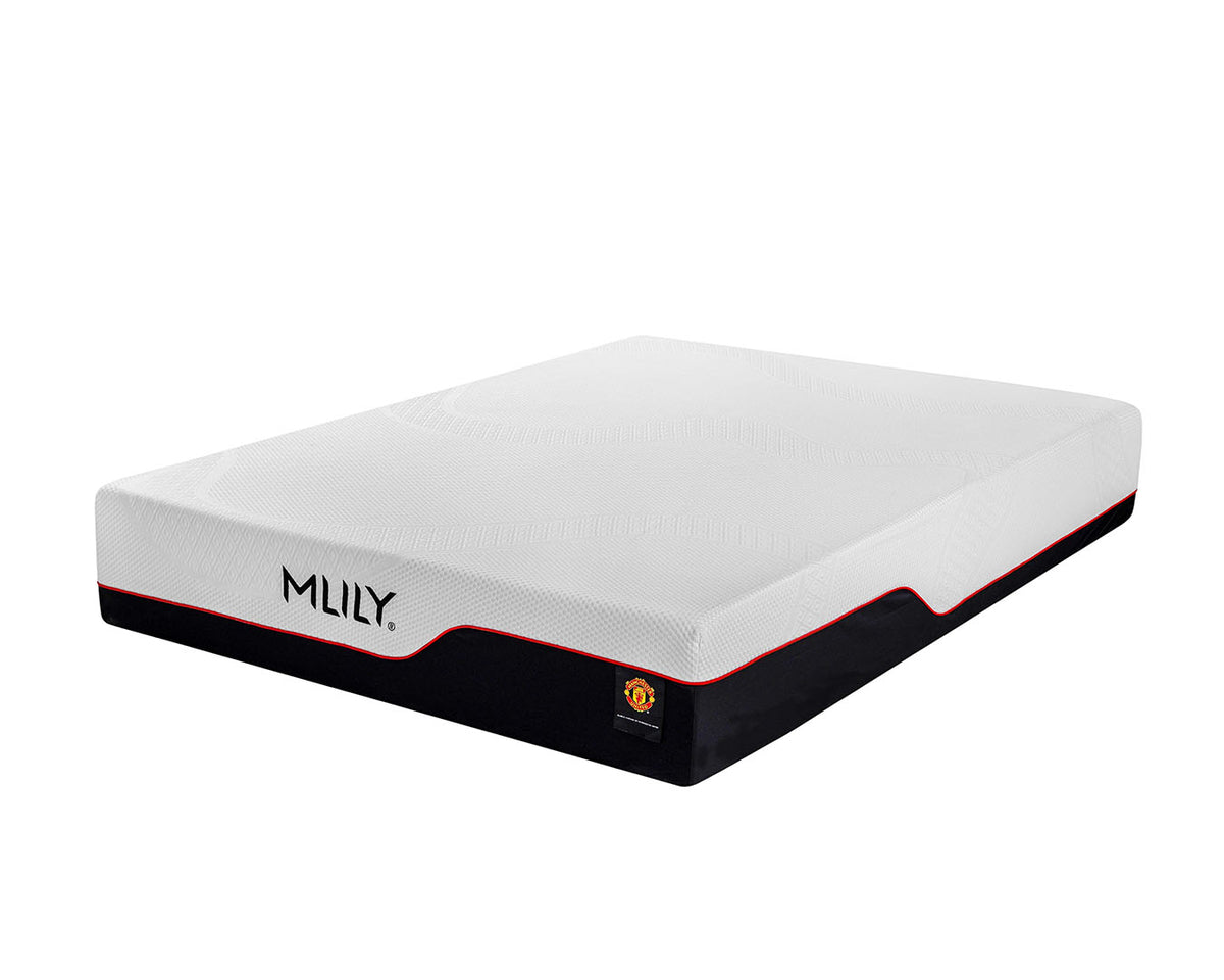 A mattress shown at an angle on a plain white background, featuring a white top surface, a black base, and thin red trim lines. The brand name 'MILY' is printed on the side.