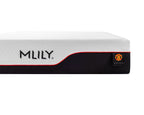 A close-up of an MLILY mattress showing its white textured top surface, a black side panel with the MLILY logo, and a small Manchester United crest patch.